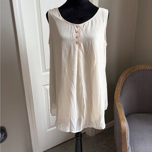 Elegant Sleeveless Blouse in Pale Yellow